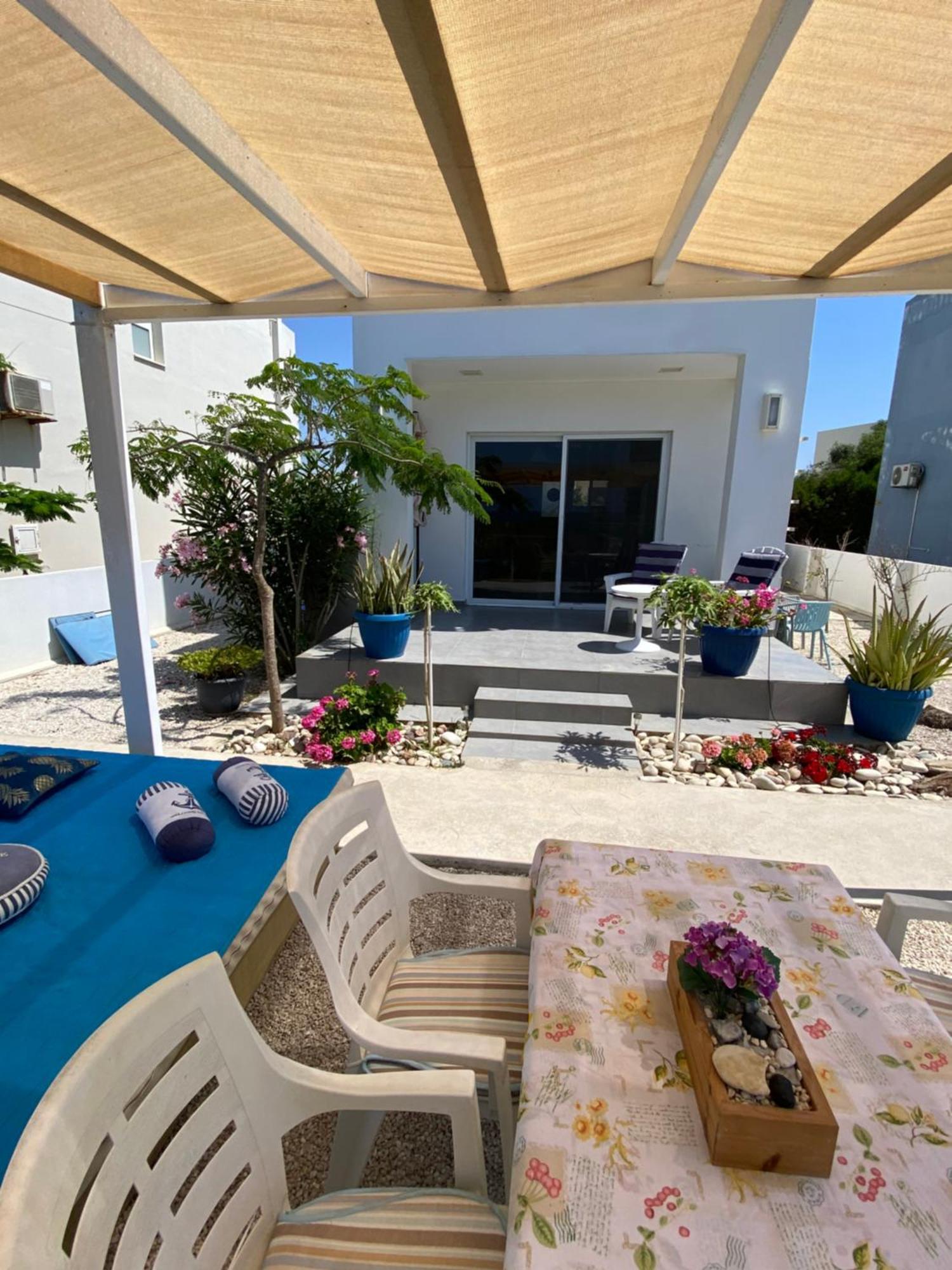 Cozy Beach House Перволия Экстерьер фото