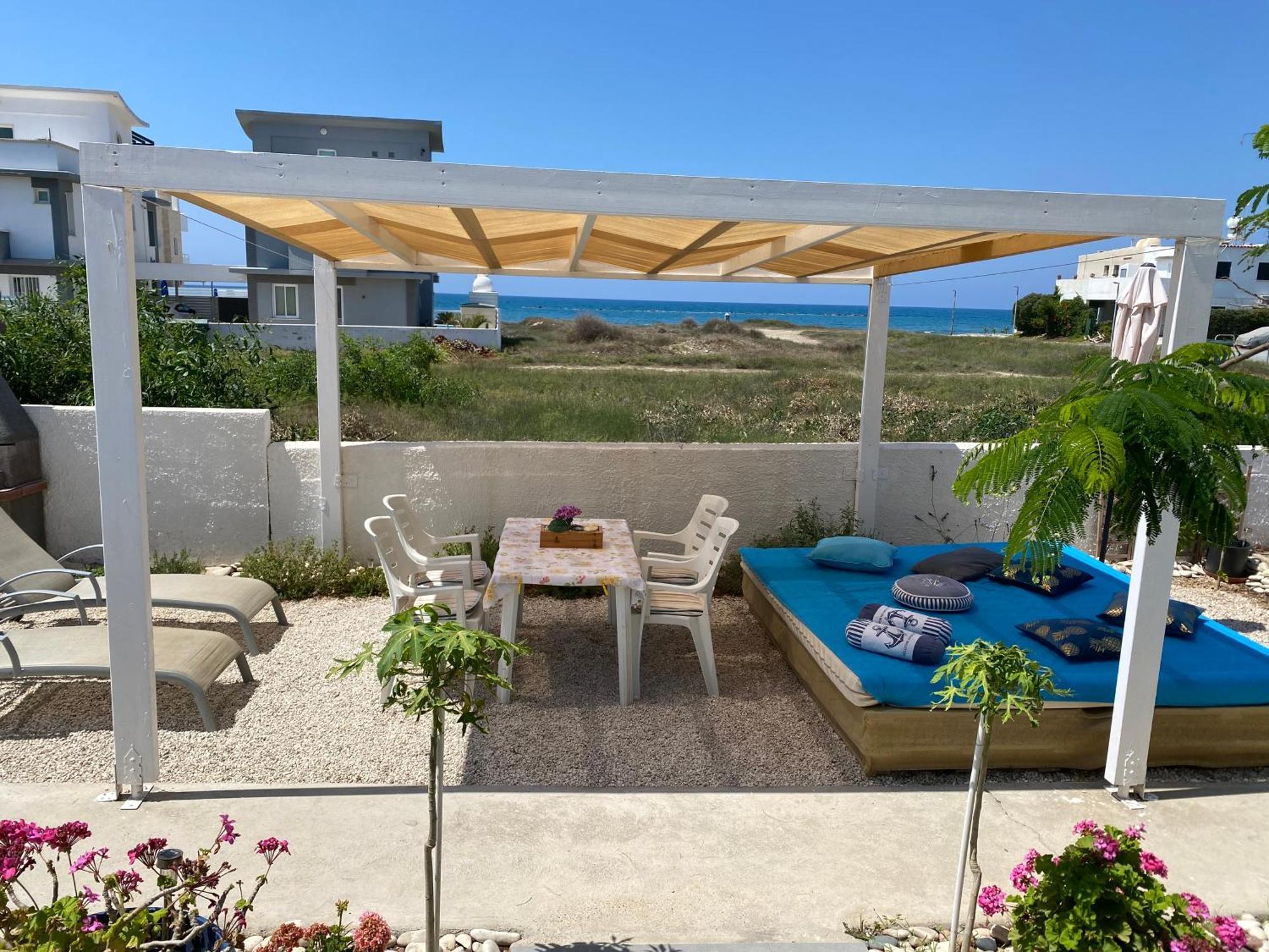 Cozy Beach House Перволия Экстерьер фото
